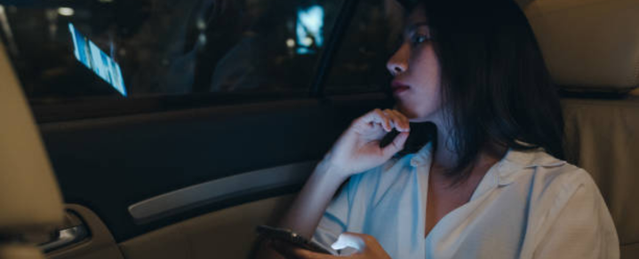 woman looking at the window car